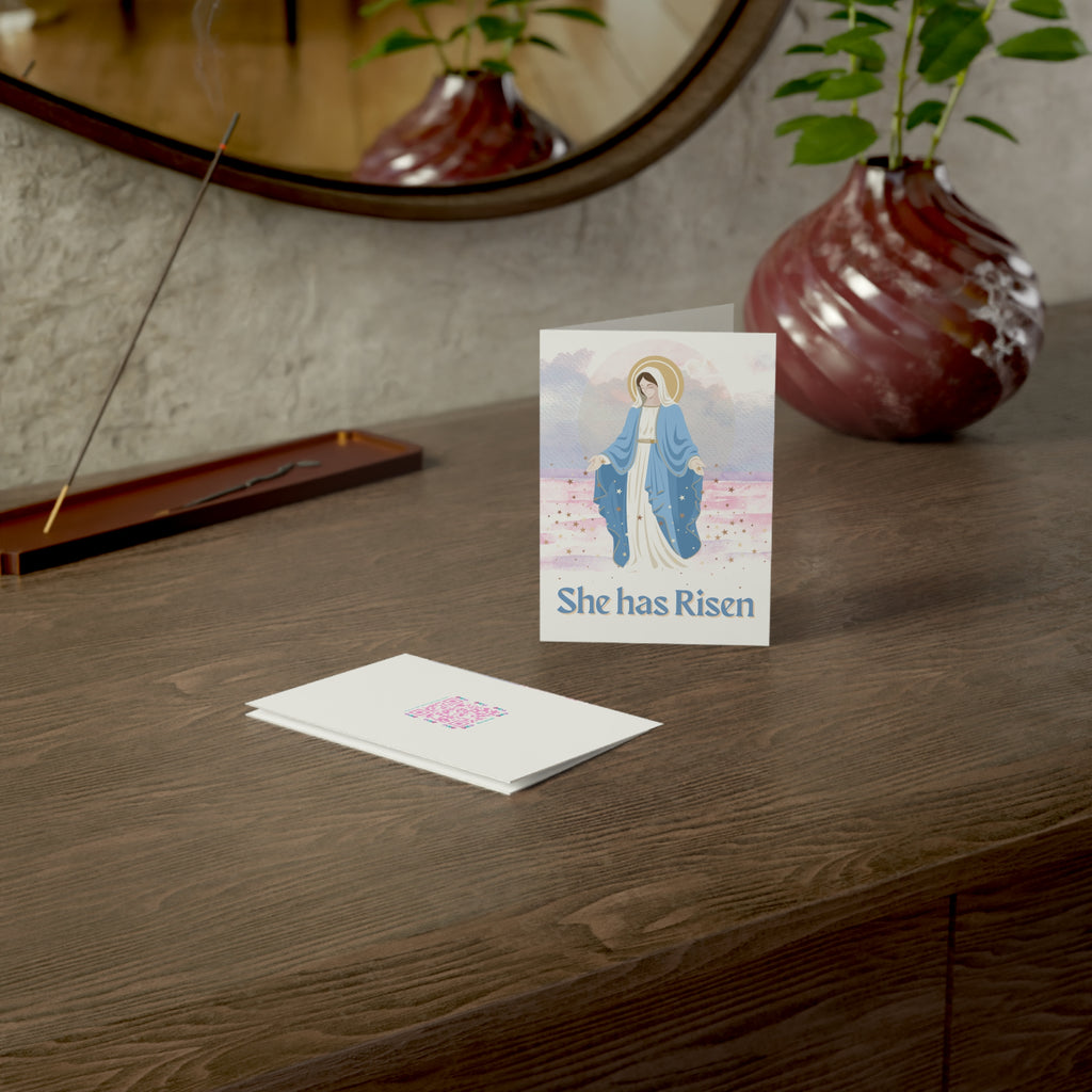 "She Has Risen" Greeting Card (Pack of 1/10/30/50)